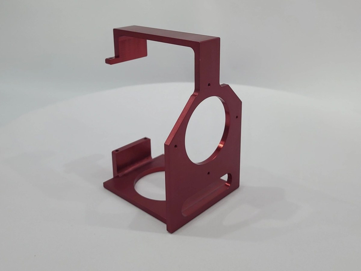 Red anodized aluminium bracket for imaging equipment